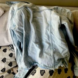 White fable denim jacket. Never worn. Needs to be ironed.